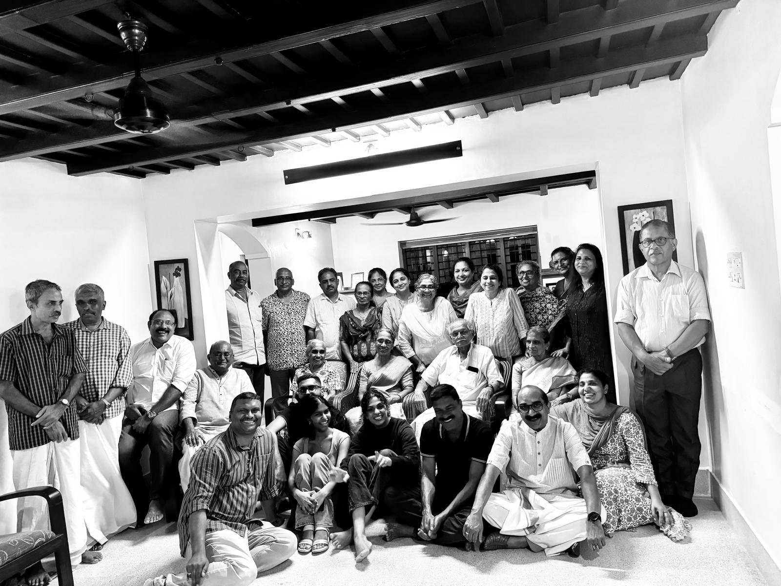 The extended family gathered in the hall of the tharavadu